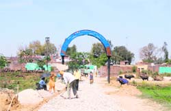 Work on the road to Suchetgarh village in full swing.