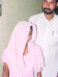 Thirteen-year-old rape victim with her rescuer Mahavir Singh in Ludhiana