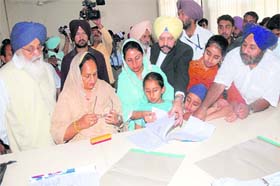 Harsimrat Kaur Badal (third from left), SAD candidate from Bathinda, files her nomination papers in Bathinda