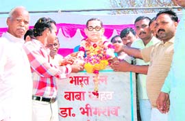 People garland a statue of Dr BR Ambedkar in Haridwar on Tuesday.