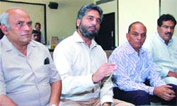 Association president Tarsem Saini addresses a press conference in Jalandhar