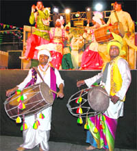 A dance troupe presents bhangra during the Baisakhi celebrations at West End Mall in Ludhiana.