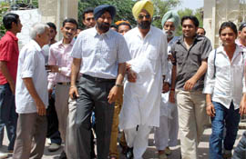 Congress candidate Raninder Singh with students at Bhana Mal Trust building in Bathinda on Wednesday.