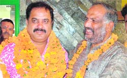 Harsh Bir Mehta, vice-president, Maidani Kranti Dal, with Subhash Sharma, senior BSP leader, at a function in Dehradun