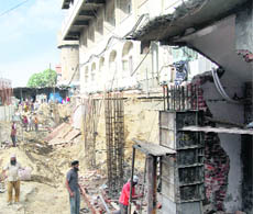 A view of the site where the roof of a building collapsed near Gurdwara Ramsar in Amritsar on Wednesday.