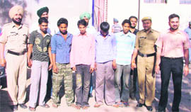 A five-member gang of snatchers in the police custody in Ludhiana on Thursday.