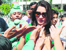 Students of Greenland Senior Secondary School seek Jividha’s autograph in Ludhiana on Thursday.