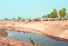 A view of changed course of Ghaggar, near Moonak, in Sangrur district on Wednesday.