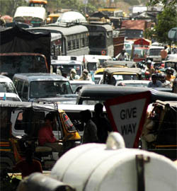 Vehicles caught in a massive traffic jam at Rajiv Chowk in Gurgaon, as many Lok Sabha candidates were crossing the Mini Secretariat located neraby to file their nomination papers