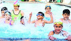 As temperature rises, kids enjoy a cool splash at the Sutlej Club swimming pool in Ludhiana