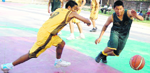 A match in progress at the 23rd Golden Jubilee Basketball Tournament at Welham Boys School, Dehradun, on Saturday.
