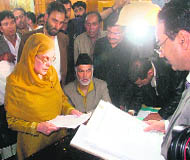 ANC candidate Khalida Shah file nomination papers in Srinagar on Saturday.