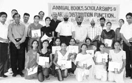 The meritorious students at the function of the Jagraon Book Club.