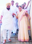 AICC general secretary and in charge of the state party affairs Mohsina Kidwai being helped by Fateh Singh Bajwa, brother of Congress candidate from Gurdaspur Partap Singh Bajwa, to climb down the stairs in Batala on Saturday