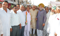 DCC president Prithipal Singh joins Agriculture Marketing Minister Gurmeet Singh Kunnar in campaigning for party candidate Bharat Ram Meghwal in Sriganganagar on Sunday.