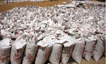 Wheat packed in plastic bags in the Mansa grain market on Sunday.