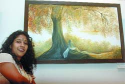 LOVE FOR ART: Sandhya R Vaish, fondly known as Little Artist,with her painting on theme ''Colours by Nature'' on display from April 15 - 21 at AIFACS in New Delhi