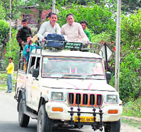 In the absence of proper state transport, overloaded private vehicles are a common sight on the Dehradun-Chakrata road; 