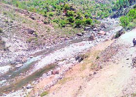A view of the mining area along the Tirthan river, near Banjar