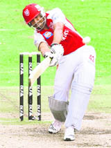 Kings XI Punjas Karan Goel plays the shot in the IPL match against Delhi Daredevils on Sunday. Goel, who scored 38, was the highest scorer from the side 
