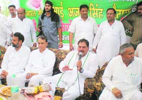 INLD leader Abhey Chautala campaigns for party nominee Sita Ram in Nagpur village in the Sirsa parliamentary seat