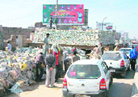 The chaotic traffic on the road leading to the railway crossing in Sirsa.