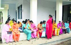Anganwari workers and helpers outside the CPDO office at Kangra