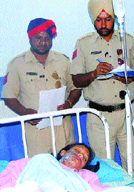 The girl, who was injured in an acid attack, in a private hospital in Jalandhar on Monday.