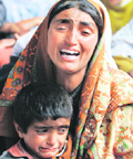 Relatives of Hizbul ultra Abdul Rashid mourn his killing in an encounter at Ganistan, 27 km from Srinagar, on Monday.
