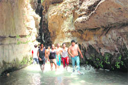 Visitors have fun at Robbers Cave. 