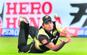 Yashpal Singh of The Kolkata Knight Riders dives in an unsuccessful attempt to catch Yuvraj Singh of King's XI Punjab during their IPL T20 match