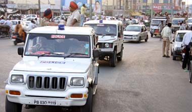 The police carrying out a flag march ahead of the Lok Sabha polls in Bathinda