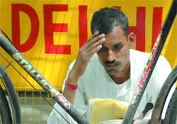 Sanjay Kumar, a hawker, whose nomination has been rejected