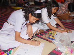 Children participate in a painting competition in Sohna, near Gurgaon, on Wednesday.