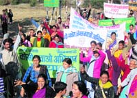A file photo of women holding a protest against hydro- electric projects in Uttarakhand