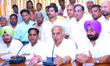 Congress candidate Mohinder Singh Kaypee welcomes members of the Christian Front into the party fold in Jalandhar on Wednesday.