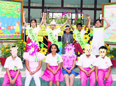 Students resolve to make earth a heaven at Peace Public School in Ludhiana on Wednesday.