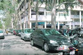 Cars lined up on the main road in Sector 17, Chandigarh, for the press conference of BSP candidate Harmohan Dhawan on Thursday.