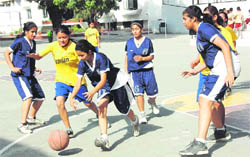 A match under way at the District Junior U-18 Basketball Championship in Dehradun on Thursday.