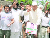NPP candidate Gurinder Sood on the way to the Mini Secretariat on a bicycle to file his nomination in Ludhiana on Thursday.
