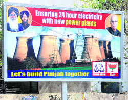 An Akali Dal hoarding in Bathinda promises 24-hour power supply. 