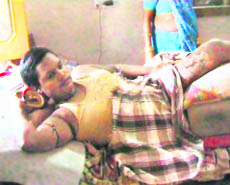 Ramu lying on the bed at his residence in Kalka.
