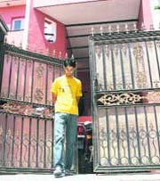 Rohit Chopra outside his residence in Jammu