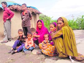 Families whose members were killed by militants in Dhar and Gabbar villages of the Buddhal tehsil.