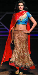 A model displays an outfit of designer Preeti Bahl's Spring Summer Collection during a fashion show in New Delhi on Saturday.