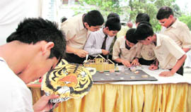 Students prepare for the competition at Welhams Boys School in Dehradun on Saturday.