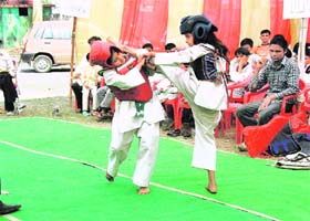 Young players in action at the Open Inter-School Taekwon-Do competition in Dehradun