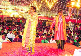 Ram Avtar Sharma, a devotional singer, recites a bhajan and Suresh Kumar performs a jhanki at a jagran in Ahmedgarh