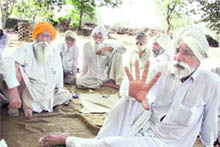 Elderly residents of cancer-hit Jajjal village in Bathinda are satisfied that the equipment of the reverse osmosis system has finally reached the village to provide pure drinking water.