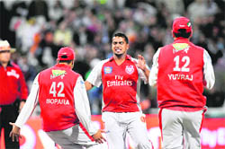 Kings XI Punjab bowler Abdulla Yusuf (C) celebrates the dismissal of the Rajasthan Royals batsman Robert Quiney during their IPL T20 league match at The Newlands Cricket Stadium in Cape Town on Sunday.